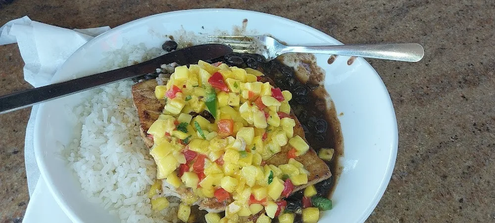 Blackened Mahi over Black Beans and Rice Topped with Mango Salsa